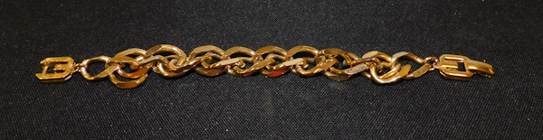 lot 337 image: Givenchy  double strand gold tone bracelet