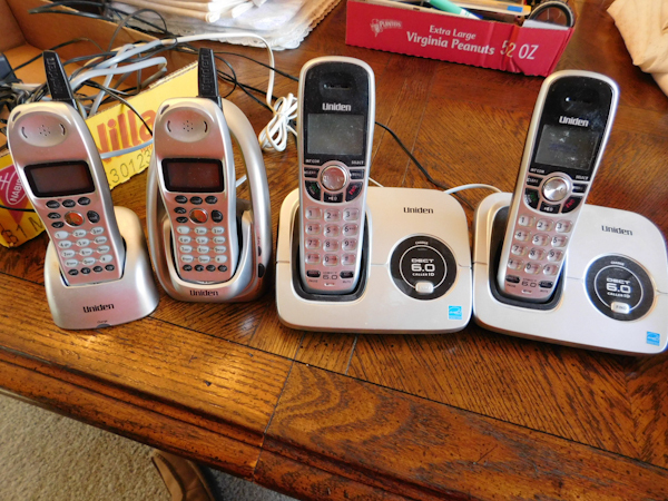 lot 359 image: lot of four uniden house portable phones they are all working when I unplugged them