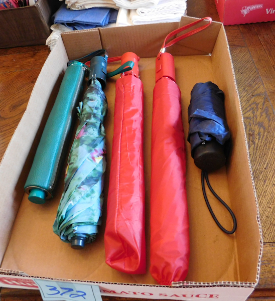 lot 372 image: five umbrellas