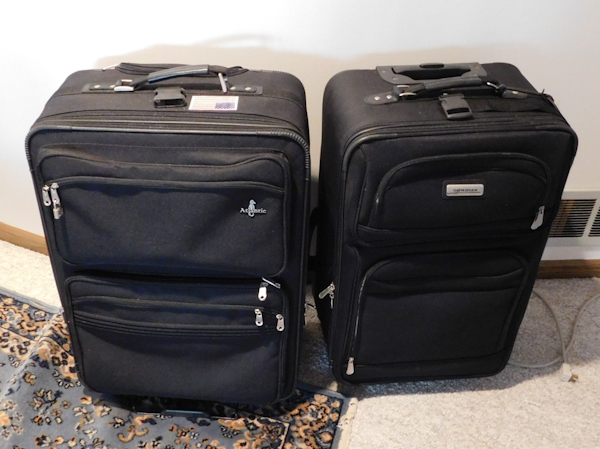 lot 387 image: two suitcases large size