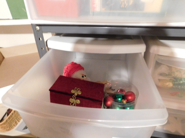 lot 391 image: 4 medium plastic drawer units and the Christmas contents inside