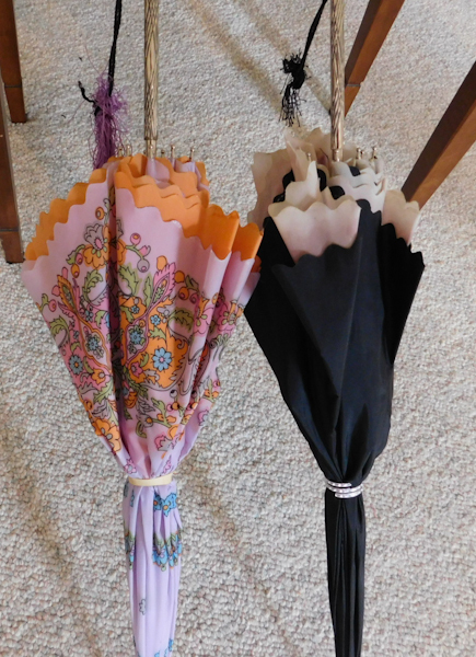 lot 402 image: two very colorful umbrellas jeweled handles