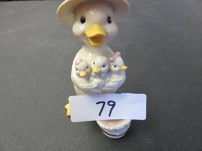 Lenox, duck with three chicks