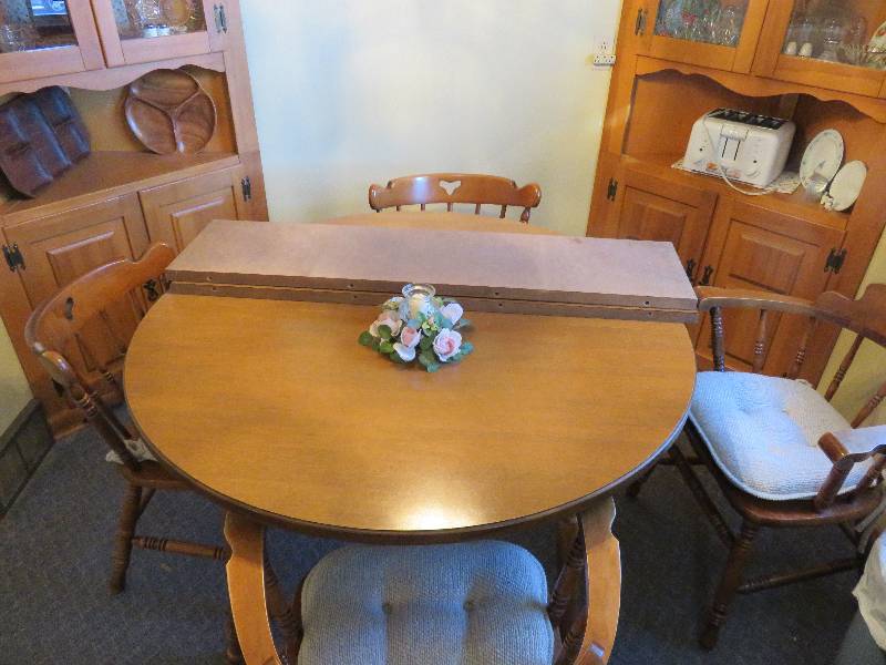 wood kitchen table with four chairs