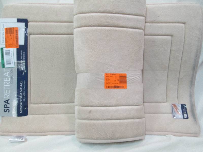 Lot of 2 tan memory foam bath mats,...