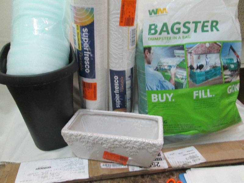 Small black waste basket, packing m...