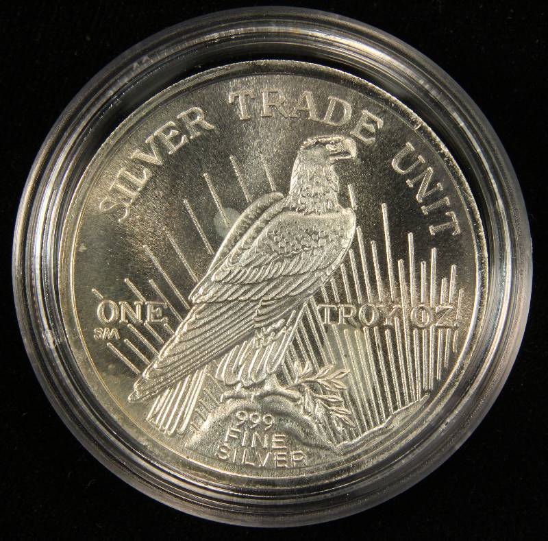 1 TROY OZ. .999 FINE SILVER PEACE DOLLAR 1986 SILVER TRADE UNIT IN AIRTITE HOLDER