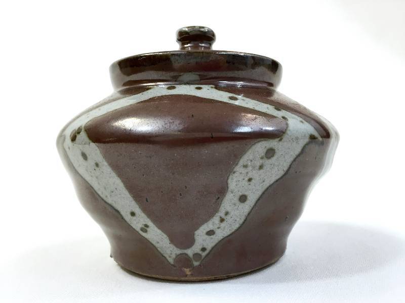 Artisanal pottery clay bowl with lid