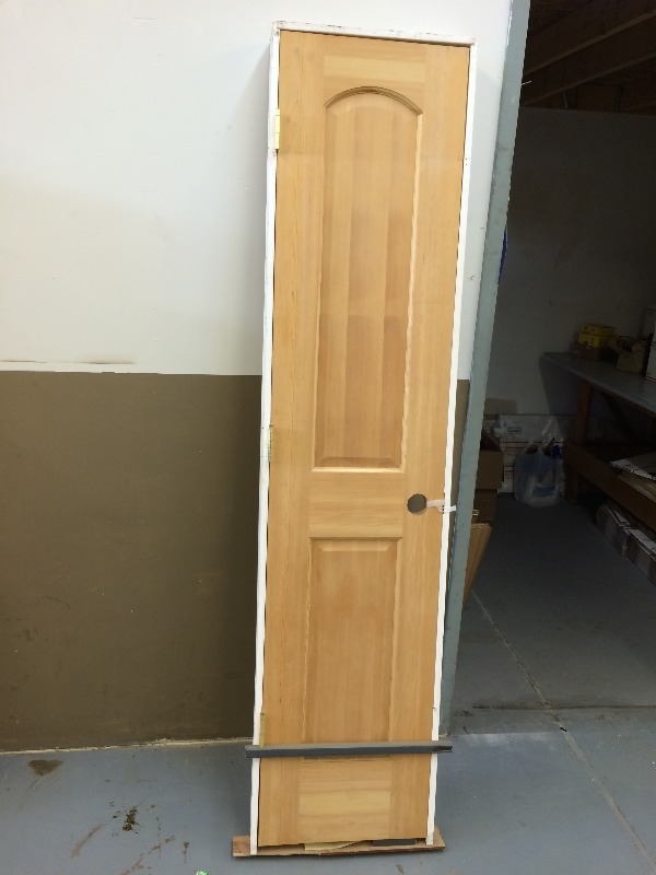 2 panel solid door & frame -  18 W x 80 T   very good condition panel solid door & frame