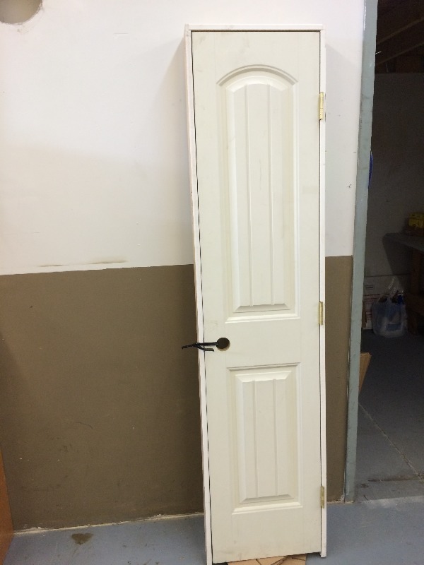 2 panel solid door & frame -  18 W x 80 T   very good condition