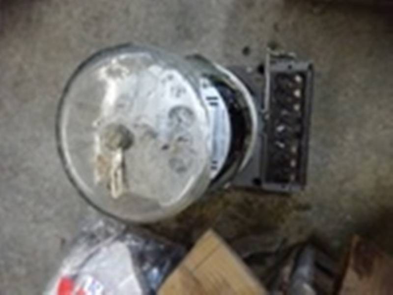 Electric Meter. Broken Glass