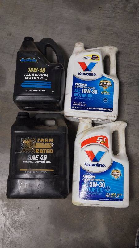 Lot of Four 1-Gallon  Motor Oil (1 is Diesel)