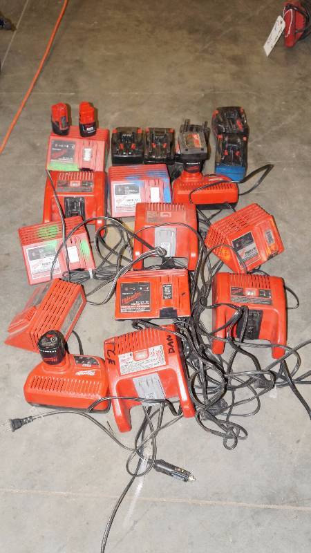 Tote of Various Milwaukee Chargers & Batteries