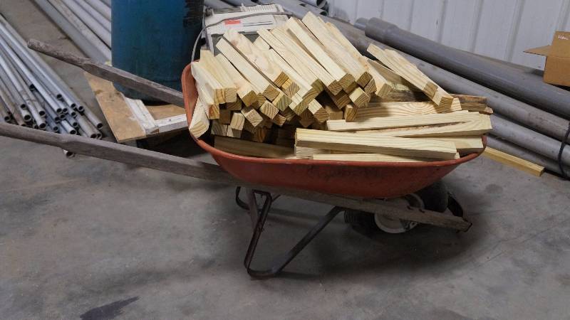 Wheel Barrow Filled with Wood Stakes