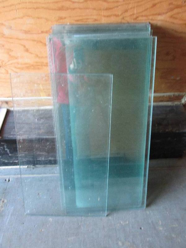 26 glass shelves 25- 14 x 28, 1-14 ...