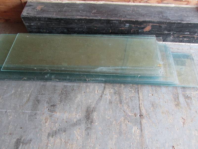 25 glass shelves 13- 12 x 47 , 1-...