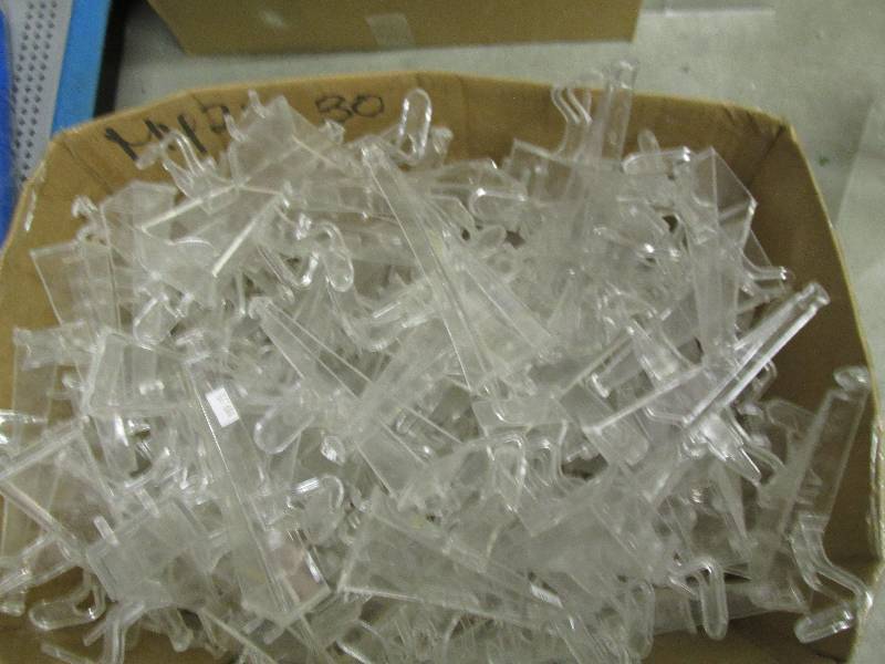 box of clear plastic hooks ...