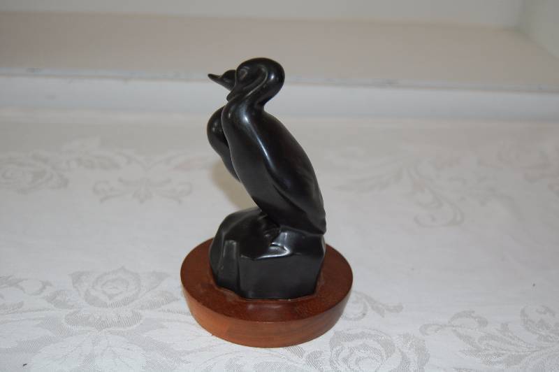 Walnut Bird Statue