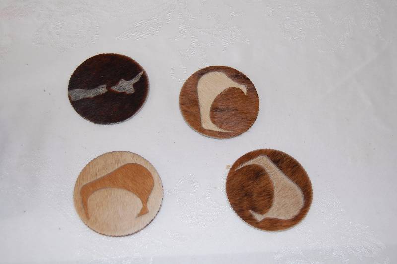 Calf Hide Coasters and Wood elephant