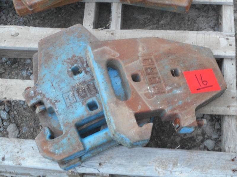 lot 16 image: (3) Heavy Duty Ford Tractor Weights...