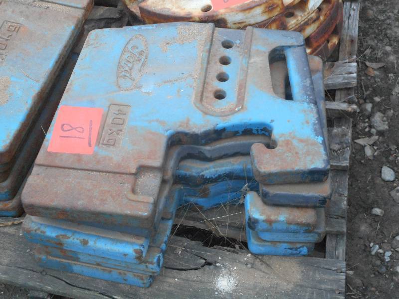 lot 18 image: (5) Ford 40Kg Tractor Weights ...