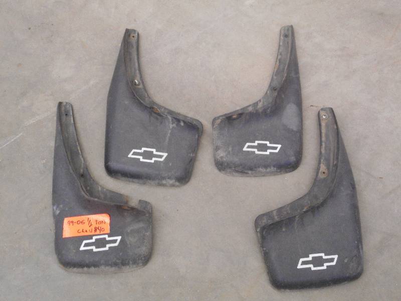 lot 75 image: Set Of 99-06 Chevy 12-Ton Mud Flap...