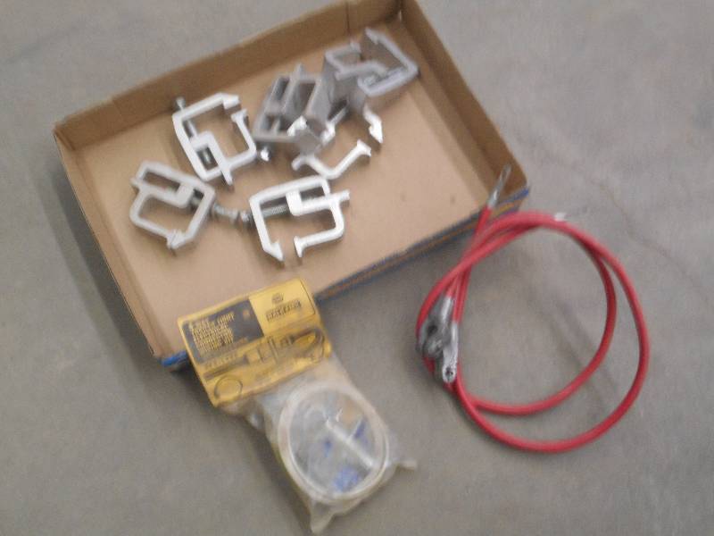 lot 86 image: Box Of Topper Clamps, Battery Cabl...