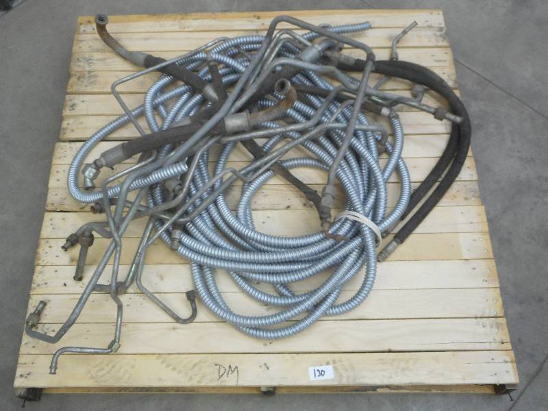 lot 130 image: Pallet Lot Skidloader Hydraulic Li...