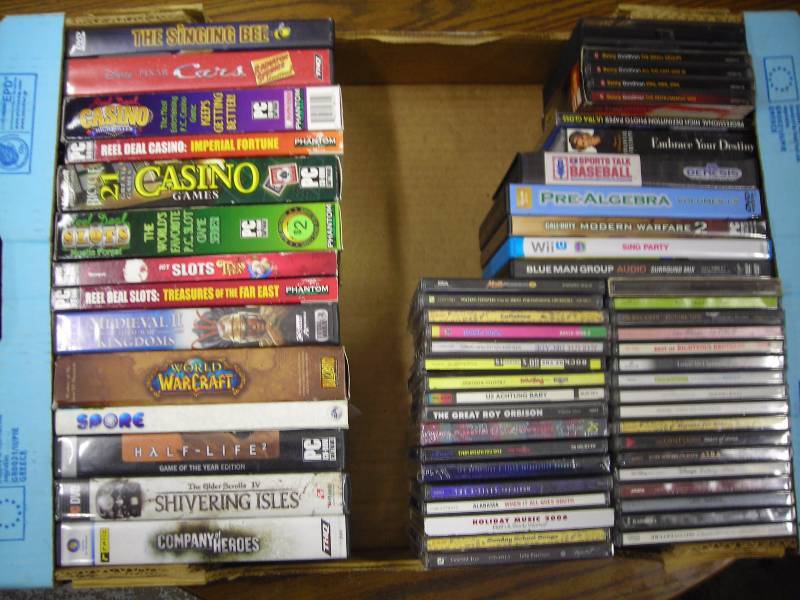 Box Lot Of 23 DVDSs, 30 CDs 80s & Holiday