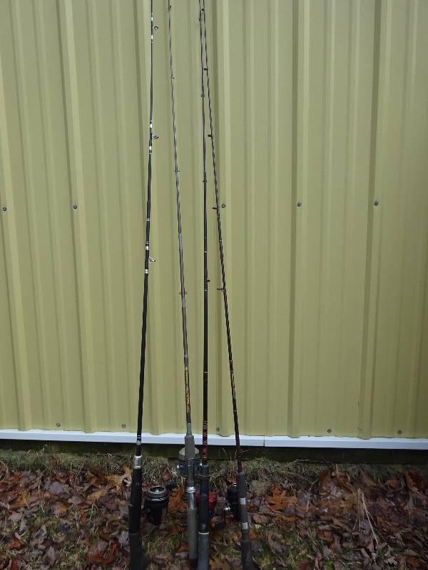 4 fishing rods with reels