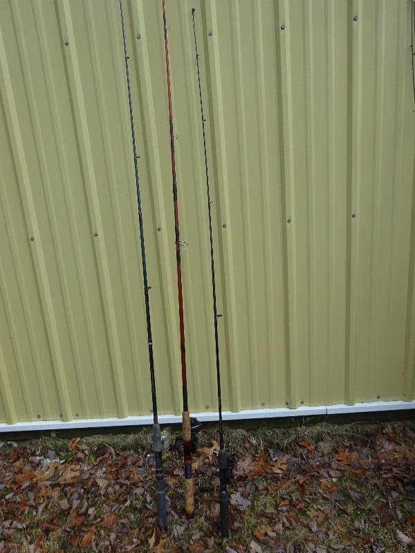 3 fishing rods with reels