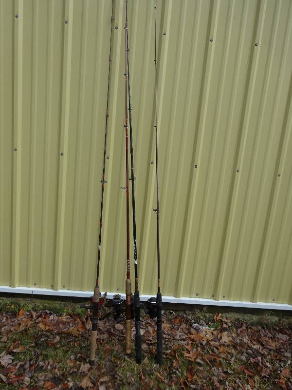 4 fishing rods with reels