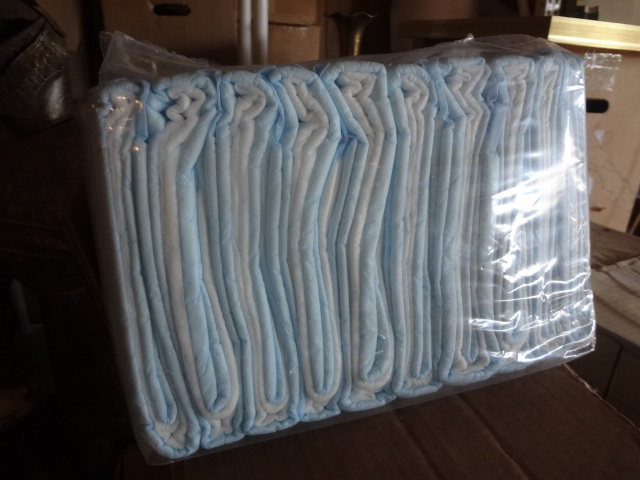 lot 125 image: Cases and Cases of Bed Pads