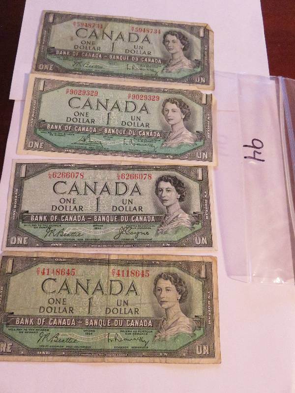 Lot of (4) Canadian One Dollar Bills