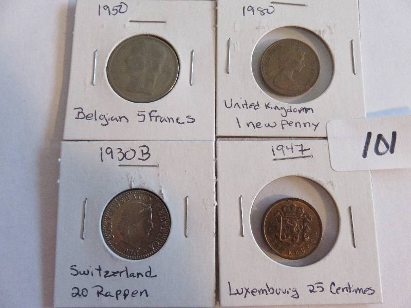 Lot of (4) Foreign Coins