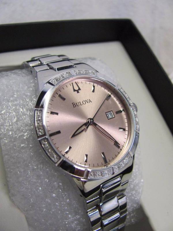 lot 6 image: Bulova Ladies Stainless Steel Rose Gold Dial Diamond Watch