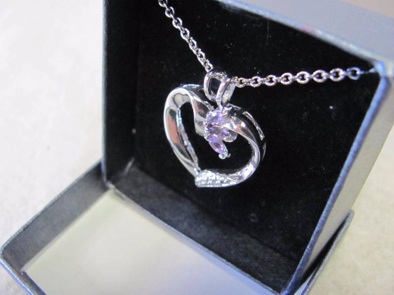 lot 125 image: Sliver Heart Pendant Studded In Crystal and Lavender Gemstones