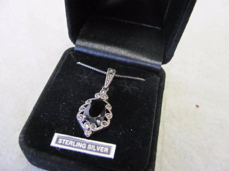 lot 127 image: Sterling Silver Vintage Teardrop Ruby Pendant