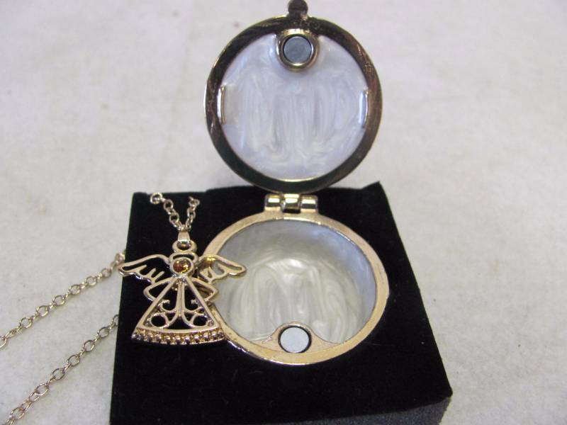 lot 129 image: November Birthstone Angel Necklace and Locket Set