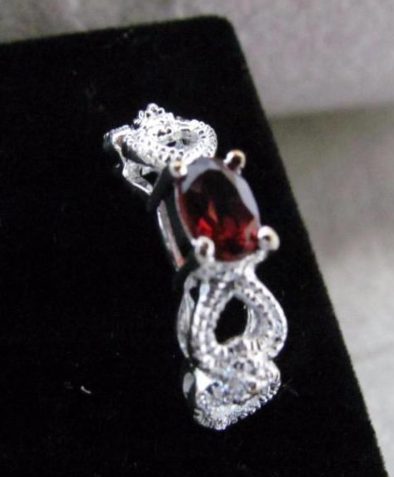 lot 133 image: Stylish Crystal & Ruby Earrings