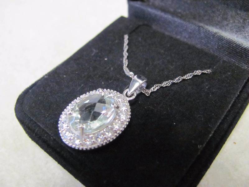 lot 140 image: Sterling Sliver Oval Crystal Pendant