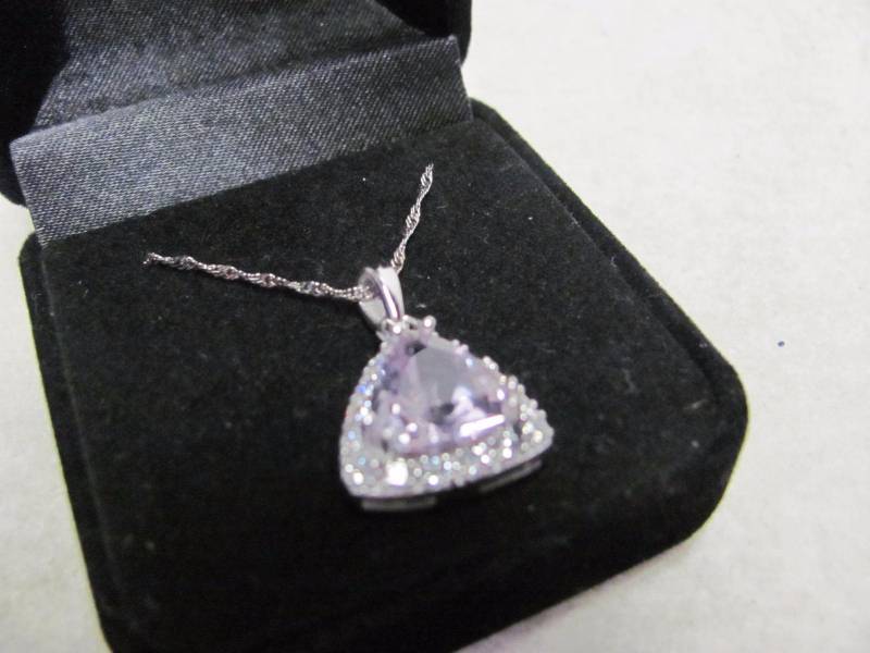 lot 143 image: Sterling Sliver Lavender Gem & Crystal Triangle Cut Pendant