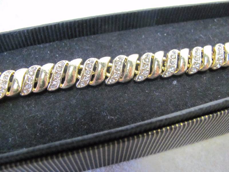 lot 175 image: Ladies Gold Tone Crystal Stud S-Link Stainless Steel Bracelet