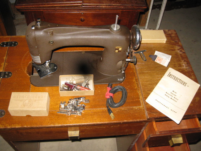 lot 35 image: Montgomery Ward Sewing Machine in Cabinet