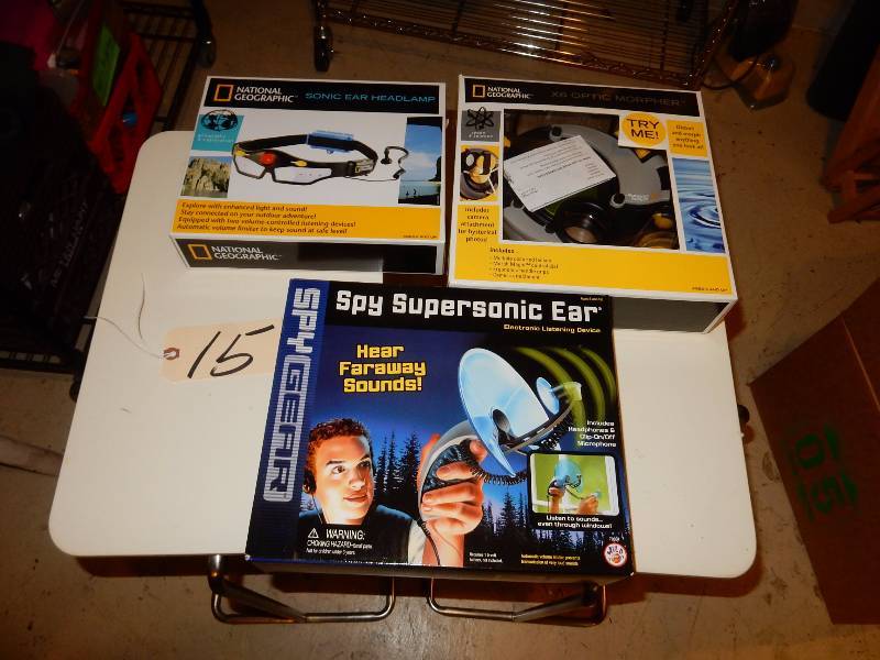 lot 15 image: 3 Electronic items  Spy Super sonic Ear X6 Optic Morpher  Sonic Ear Headlamp