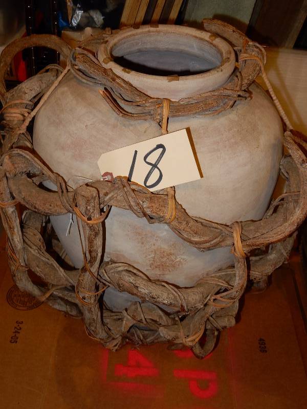 lot 18 image: Large Clay pot with heavy vines entwining it.. Very cool.. Approx 18 in diameter x 26in h.