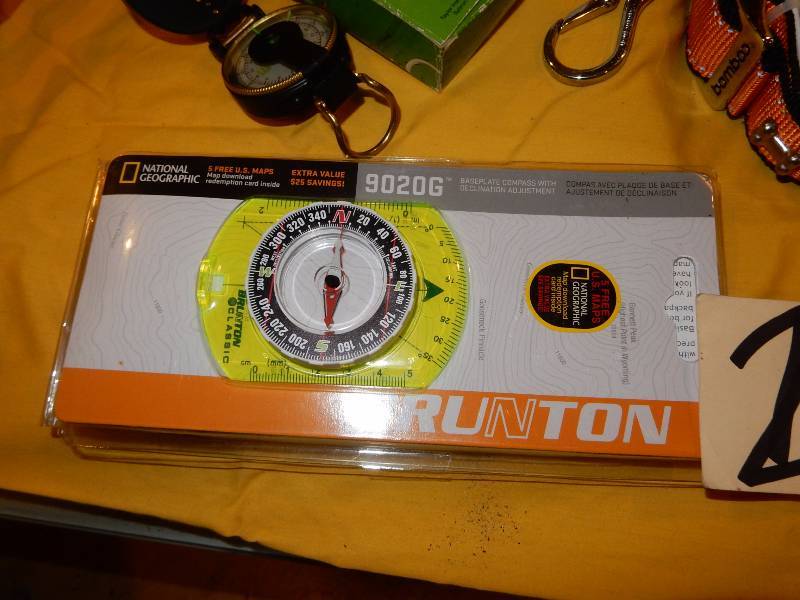 lot 26 image: Misc. items as pictured. Look at closeups.. Nice  Sling shot, compasses and more. Great Stocking Stuffers