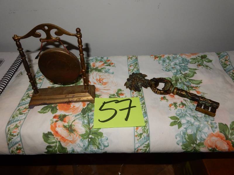 lot 57 image: Very old Brass Key with holder.. Brass GONG..  Approx 8 in h.  No mallet