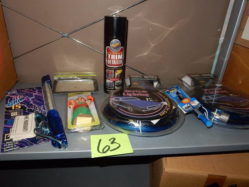 lot 63 image: Misc. Stocking Stuffer items.. Automotive Theme.  How about the Hula Pig