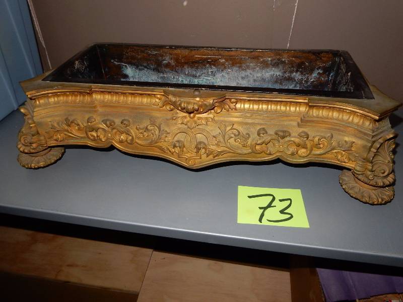 lot 73 image: Very nice Brass planter with metal insert.. Needs polish, but could be a showpiece. 20in x 10 in x 7 in h